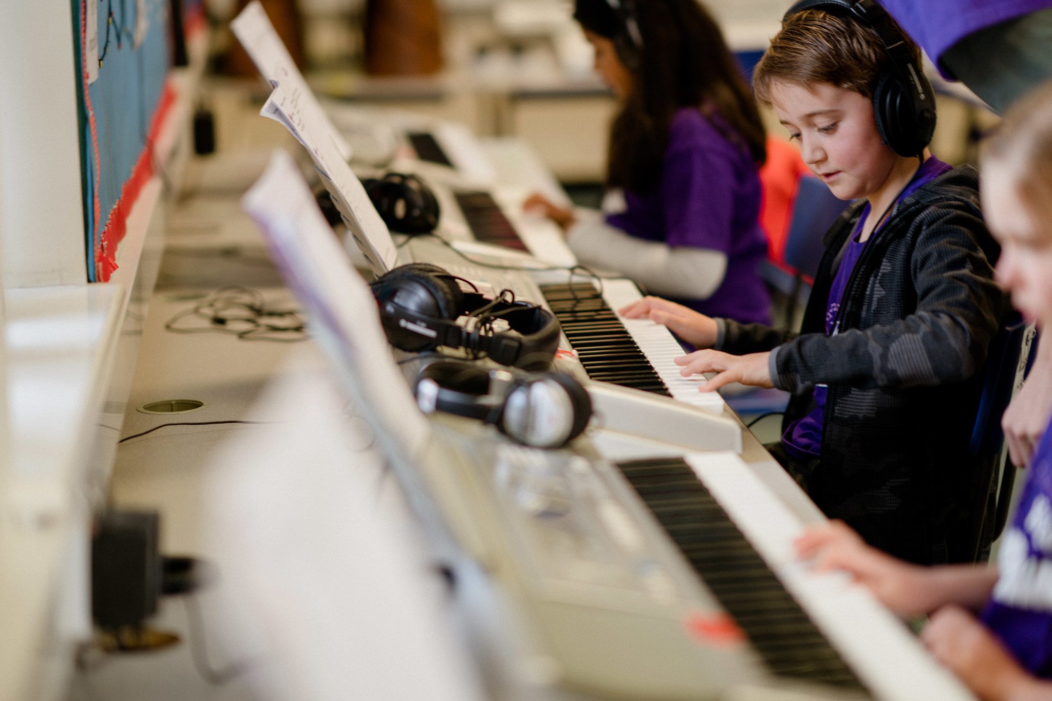Children Learning Piano Lesson